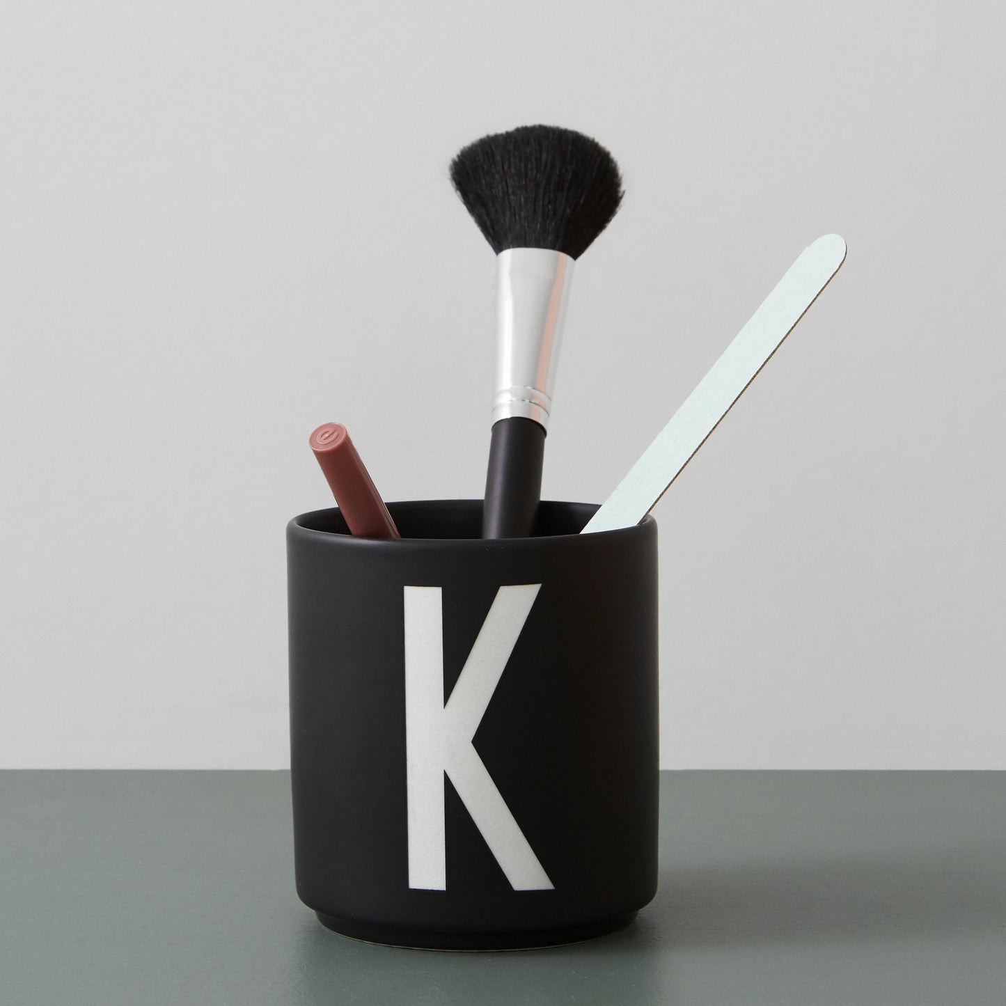 DesignLetters-porcelain-cup-black-a-zE