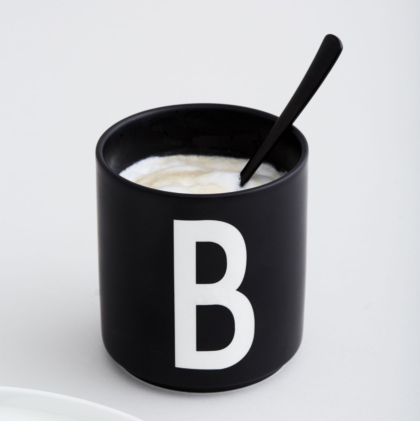 DesignLetters-porcelain-cup-black-a-zD