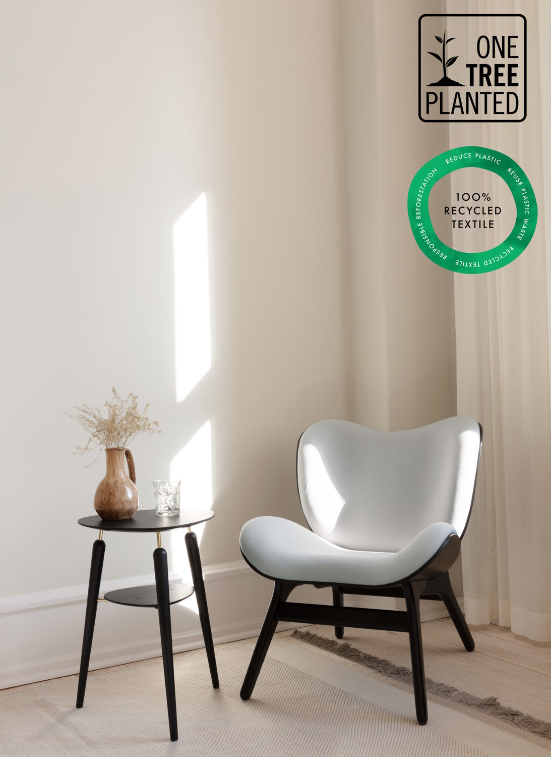 Umage-a-conversation-piece-lounge-chair-low-black-oakLeatherBrown